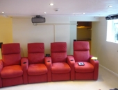 av-units-in-alcove-behind-seating