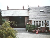 Classical style garage doors in keeping with the surroundings