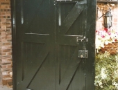 Garage doors with smaller access door