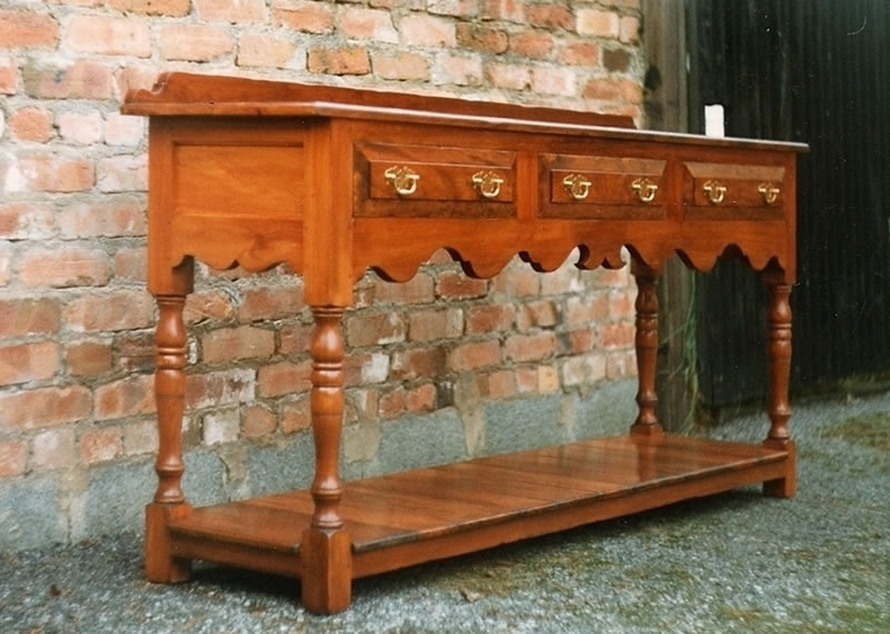 yew-dresser-base-with-shaped-bottom-rail-pot-boards-and-turned-legs
