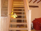 Pine stairs with twisted steel bars