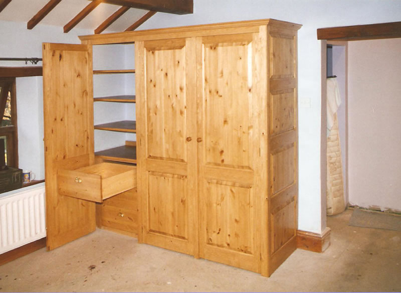 Pine wardrobe with raised and fielded panels