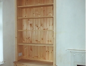 pine-alcove-dresser-style-units-with-a-gothic-shaped-top-rail-they-are-to-be-used-as-toy-storage