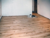 solid-oak-floor-with-brass-screwheads-sanded-flat-to-create-a-marine-appearance