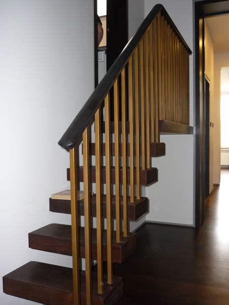 Cantilever stairs in baked oak with oak handrail