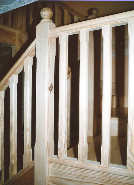 Completed landing section of yellow pine staircase