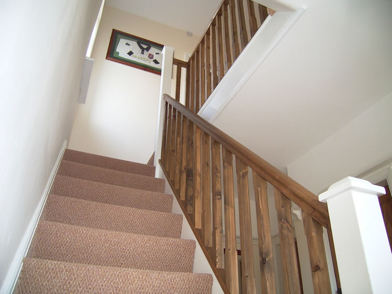 Replacement handrail and spindles on an original stair case