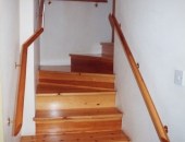 Modern style pine staircase with mopstick handrails